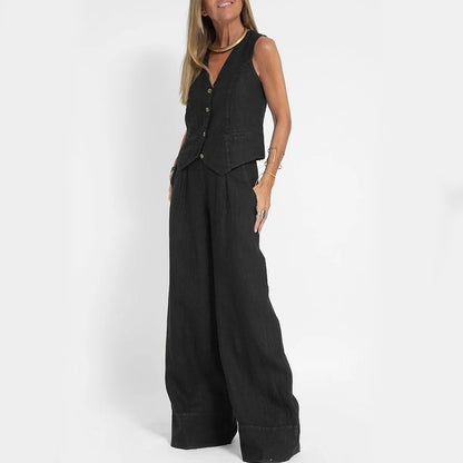 A woman's back view wearing a beige V-neck sleeveless top and matching loose trousers.